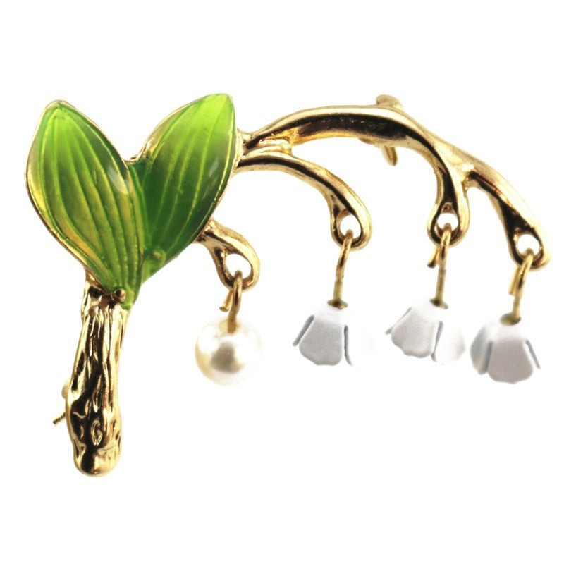 Green drip-glazed lily of the valley brooch