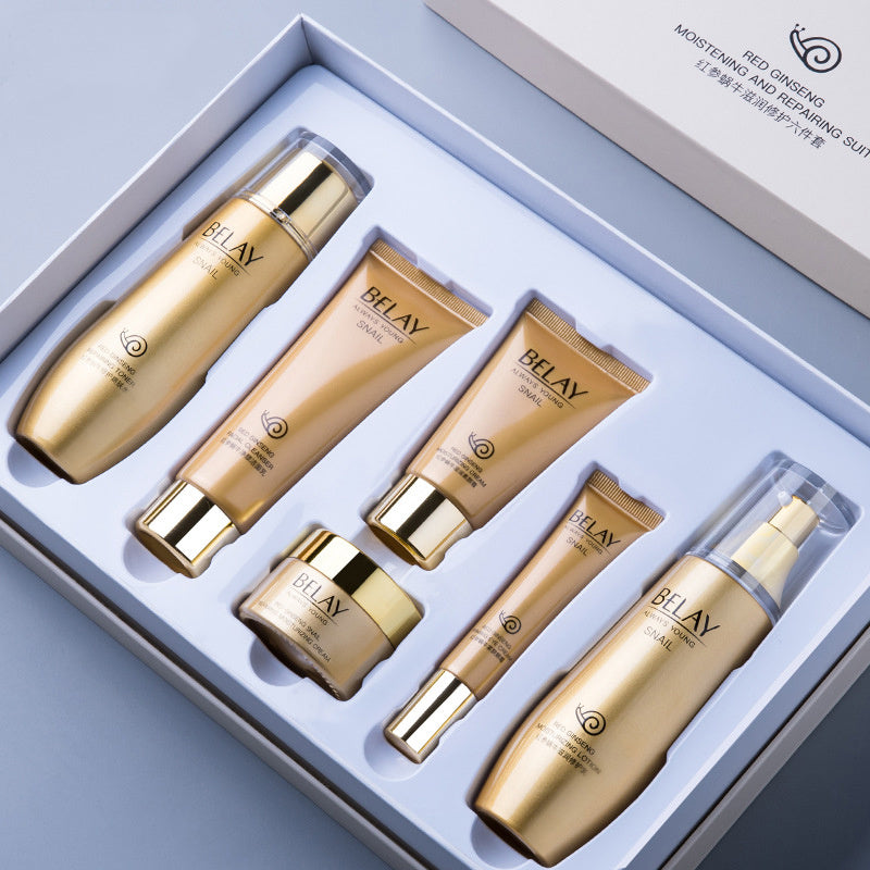 Gold and beige facial care cosmetics set with six moisturizing and repairing products in a white box