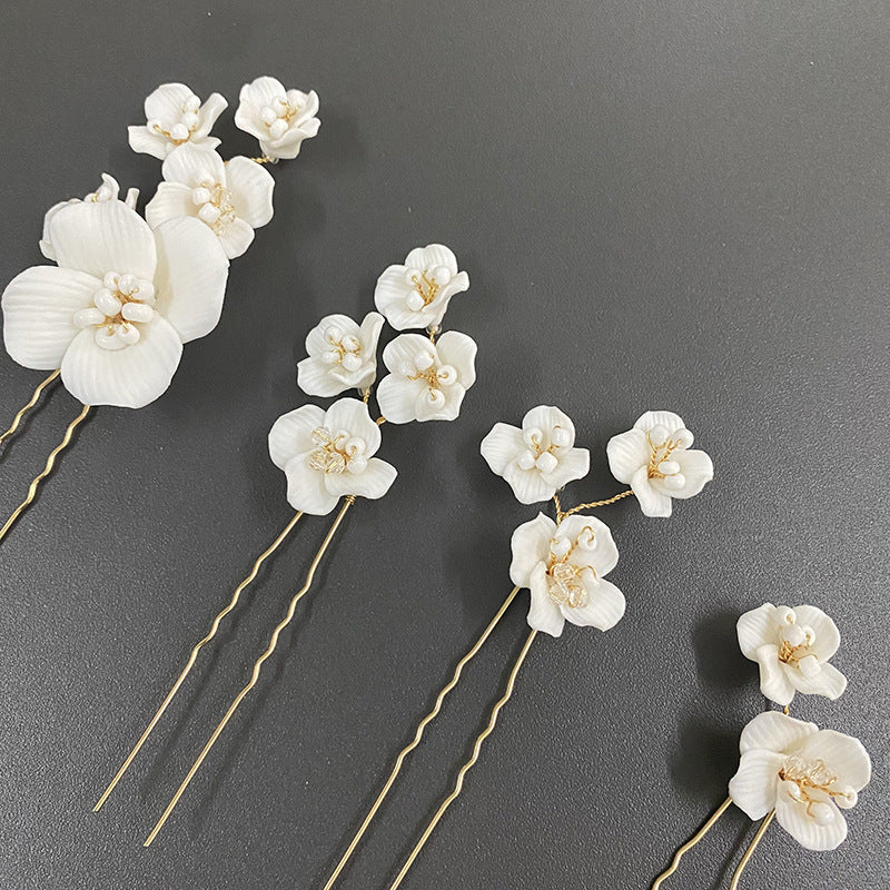 White Ceramic Flower Headed Hairpin