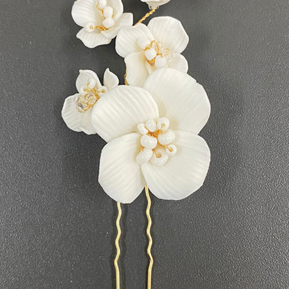 White Ceramic Flower Headed Hairpin
