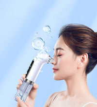 Woman using electric pore vacuum cleaner on her nose with blue background and water bubbles