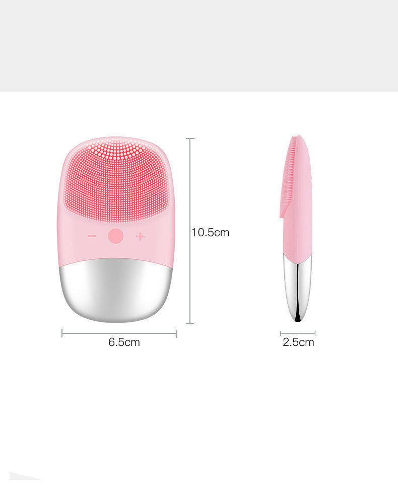 Pink electric silicone face cleansing brush with measurement dimensions shown front and side view