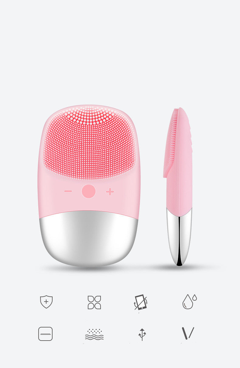 Pink electric silicone face cleansing brush with soft bristles and ergonomic design for gentle facial cleaning