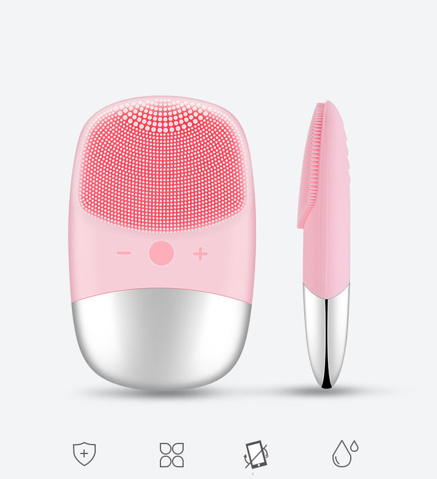 Pink electric silicone face cleansing brush with soft bristles and ergonomic design for gentle facial cleaning