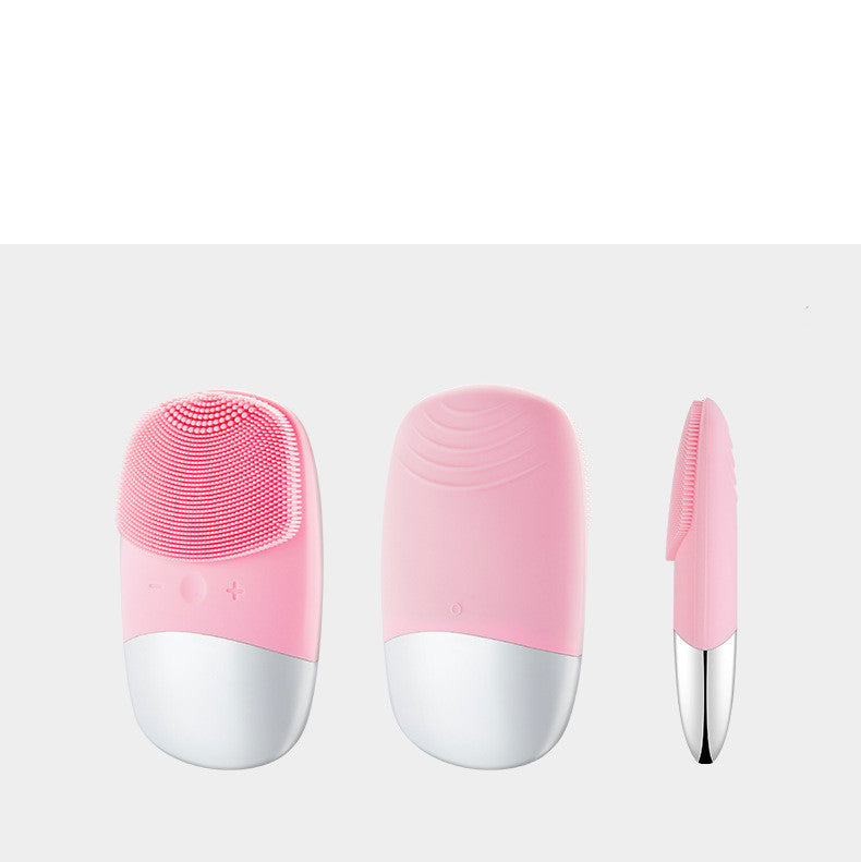 Pink electric silicone face cleansing brush shown from front back and side views with soft bristles
