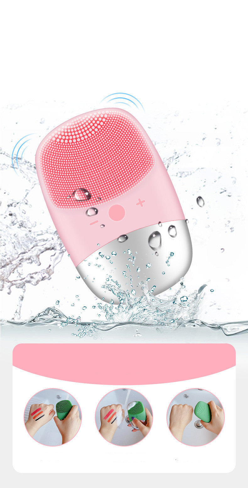 Pink electric silicone face cleansing brush with water droplets and vibration for deep facial cleaning