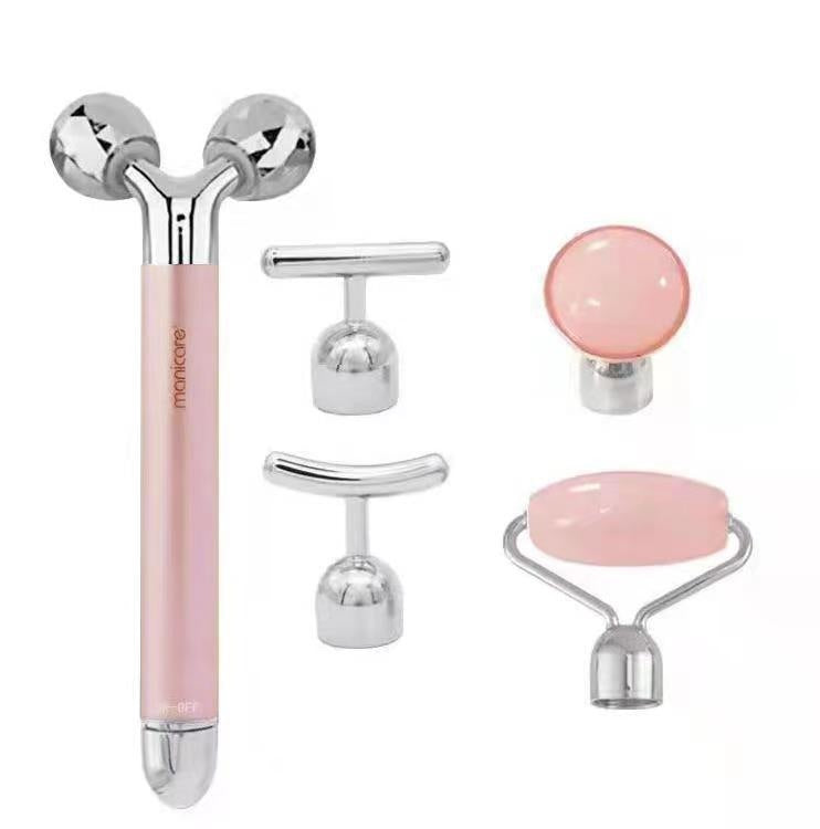 5-in-1 facial massage tool set with pink handle and multiple interchangeable heads for skincare