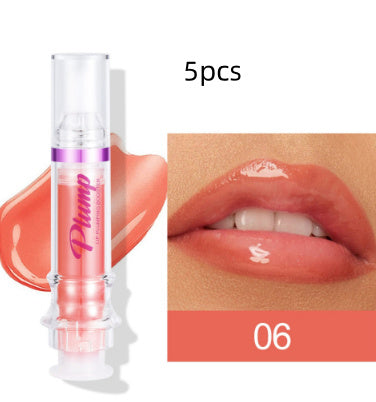 Lip plumper with chili extract in a clear tube and glossy coral color on lips shade 06