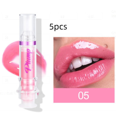 Lip plumper with chili extract in clear tube with purple label and glossy pink lips close-up