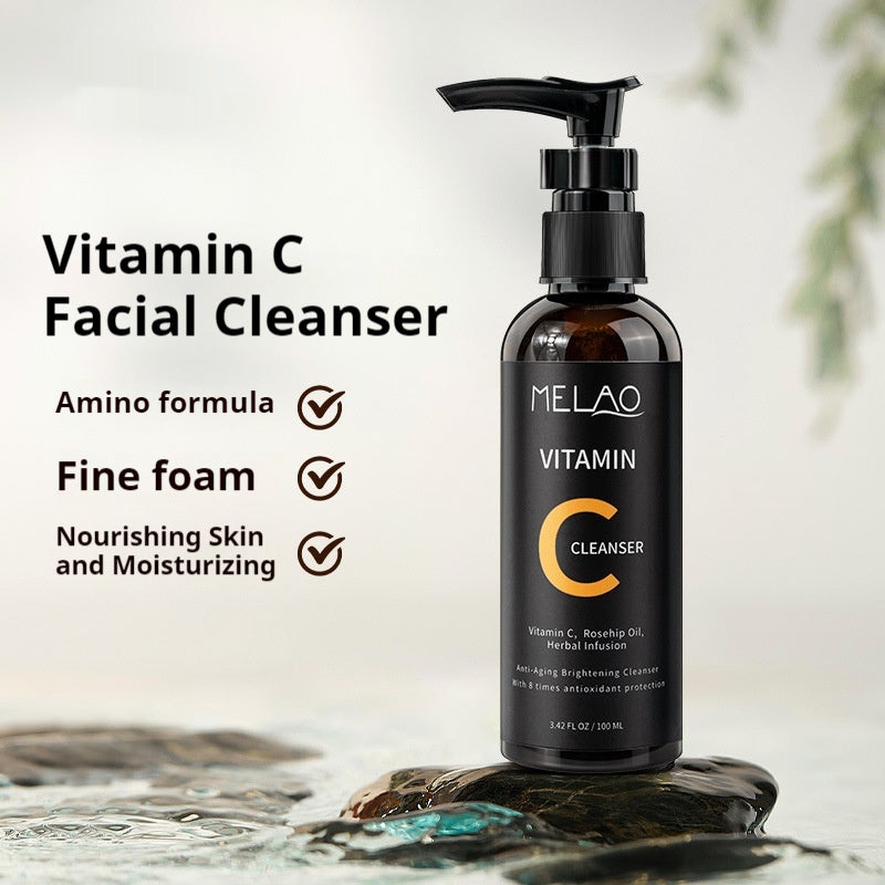 Vitamin C facial cleanser bottle with pump featuring amino formula and moisturizing properties