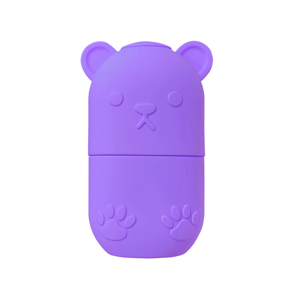 Purple bear-shaped case for ice face roller for skincare with embossed paw and face details