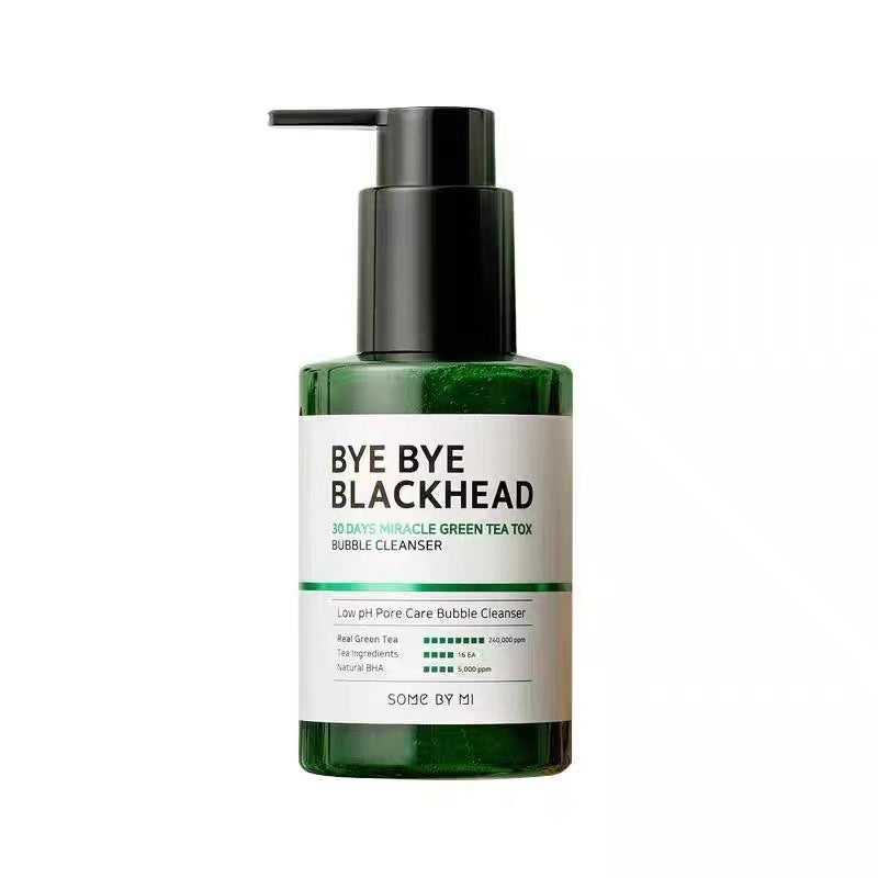 Green tea facial cleanser bottle with pump labeled Bye Bye Blackhead for pore care and detox